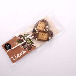 Lizak z czekolady mlecznej z ciasteczkami Leibniz i chrupiącymi kuleczkami 35 g