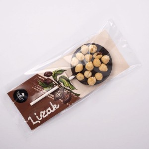 Lizak z deserowej czekolady z orzechami laskowymi 35g